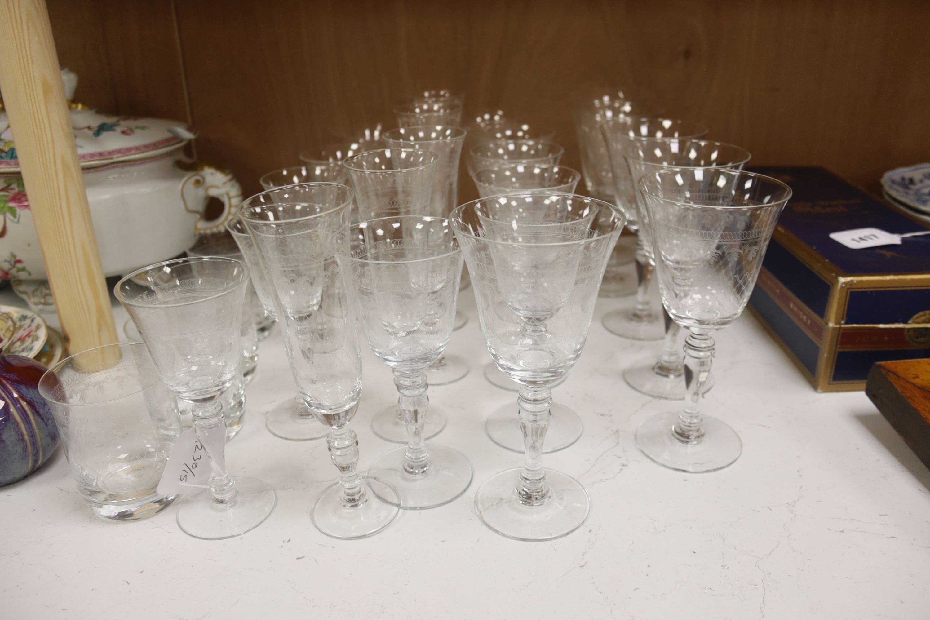 A suite of finely etched glassware, 23 pieces